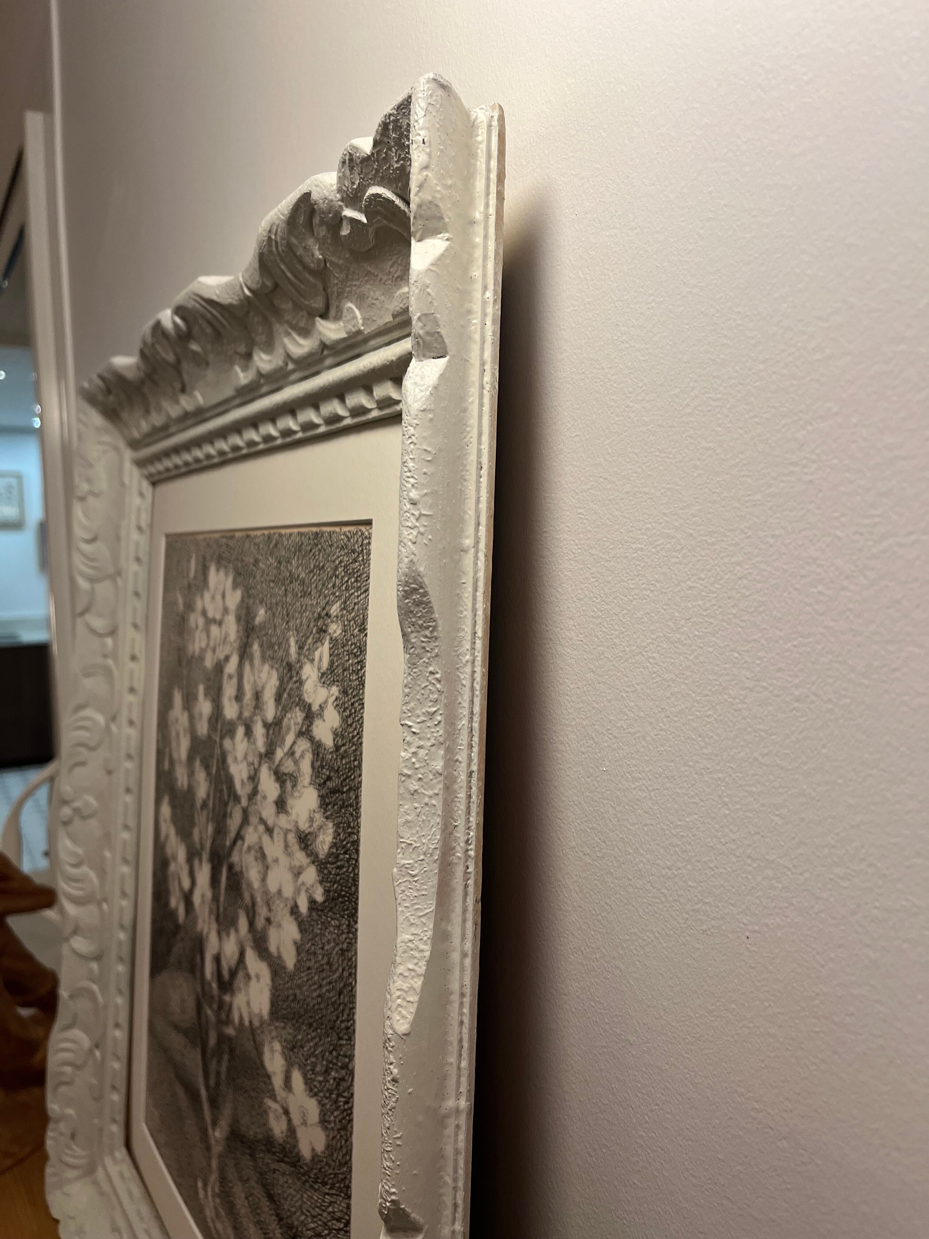 Almond branches in bloom in a glass of water