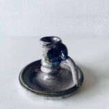 Ceramic candle holder with flower decor