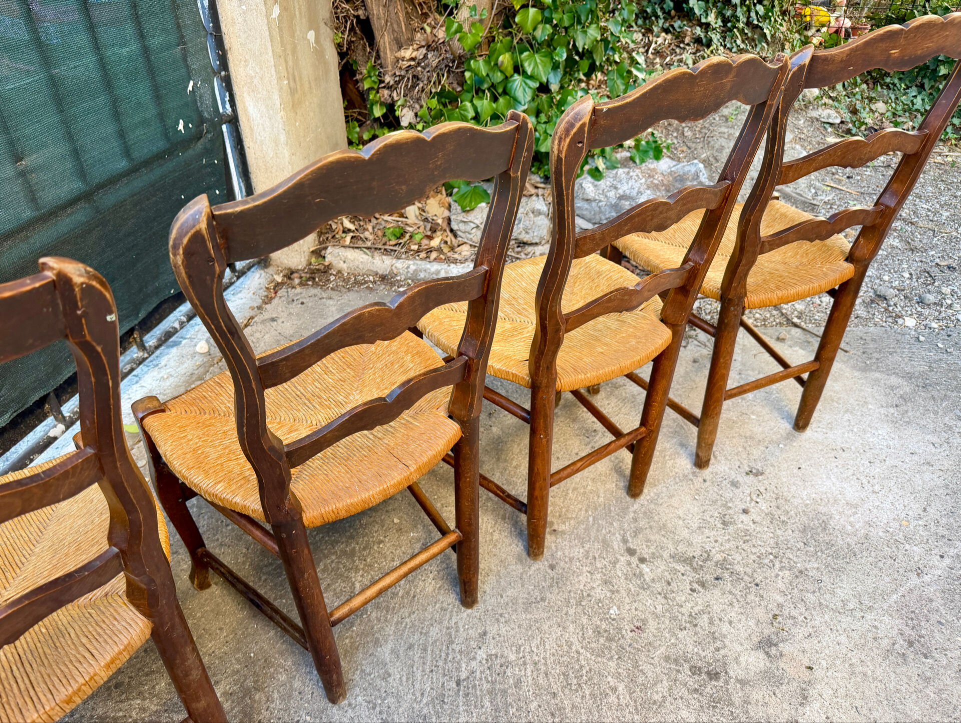 Set of 4 Provençal oak chairs with rush seats.