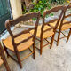 Set of 4 Provençal oak chairs with rush seats.