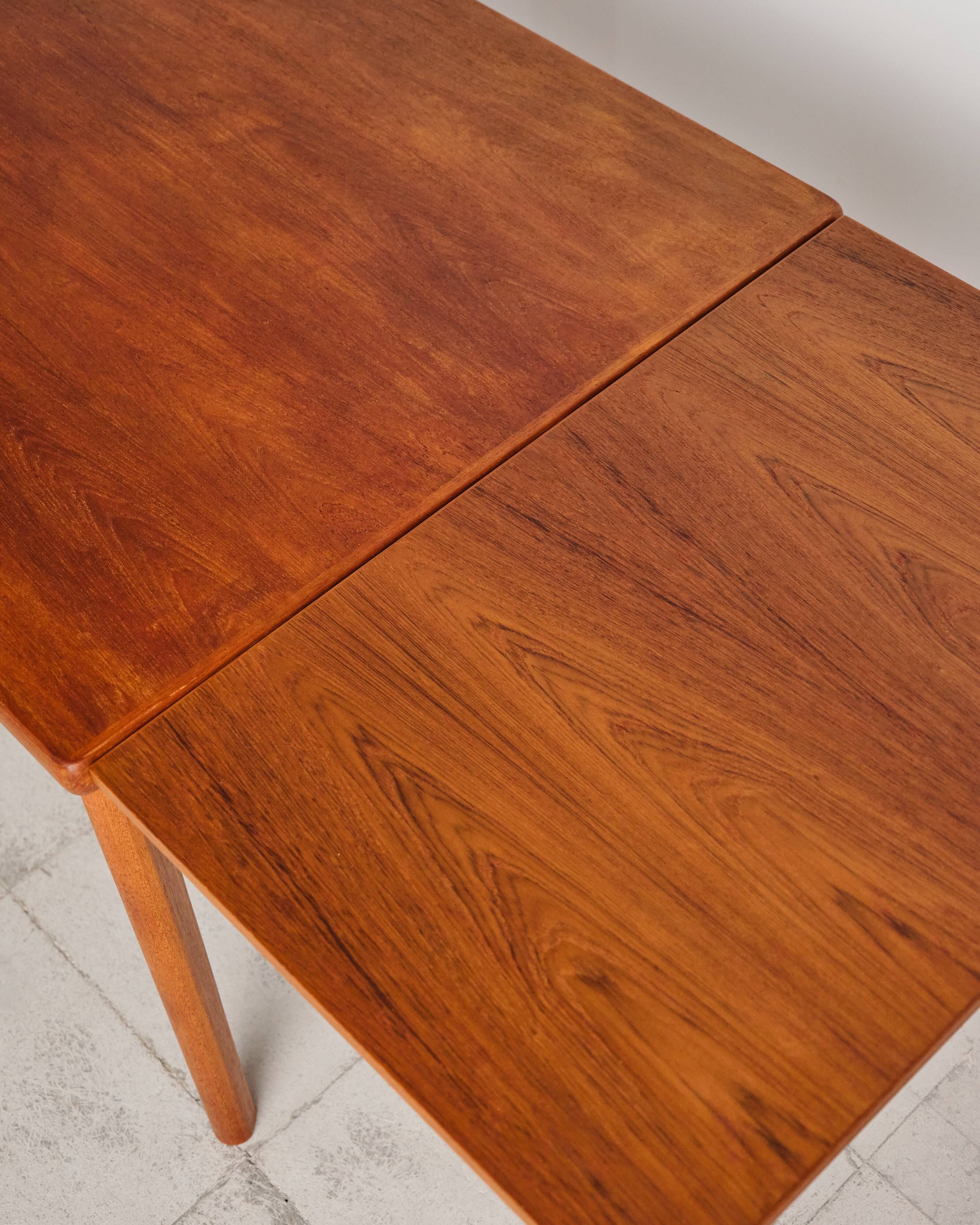 Extendable table by Henning Kjærnulf for Vejle Stole, 1960s.