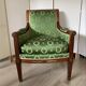 Fauteuil de style Empire en bois et tissu vert
