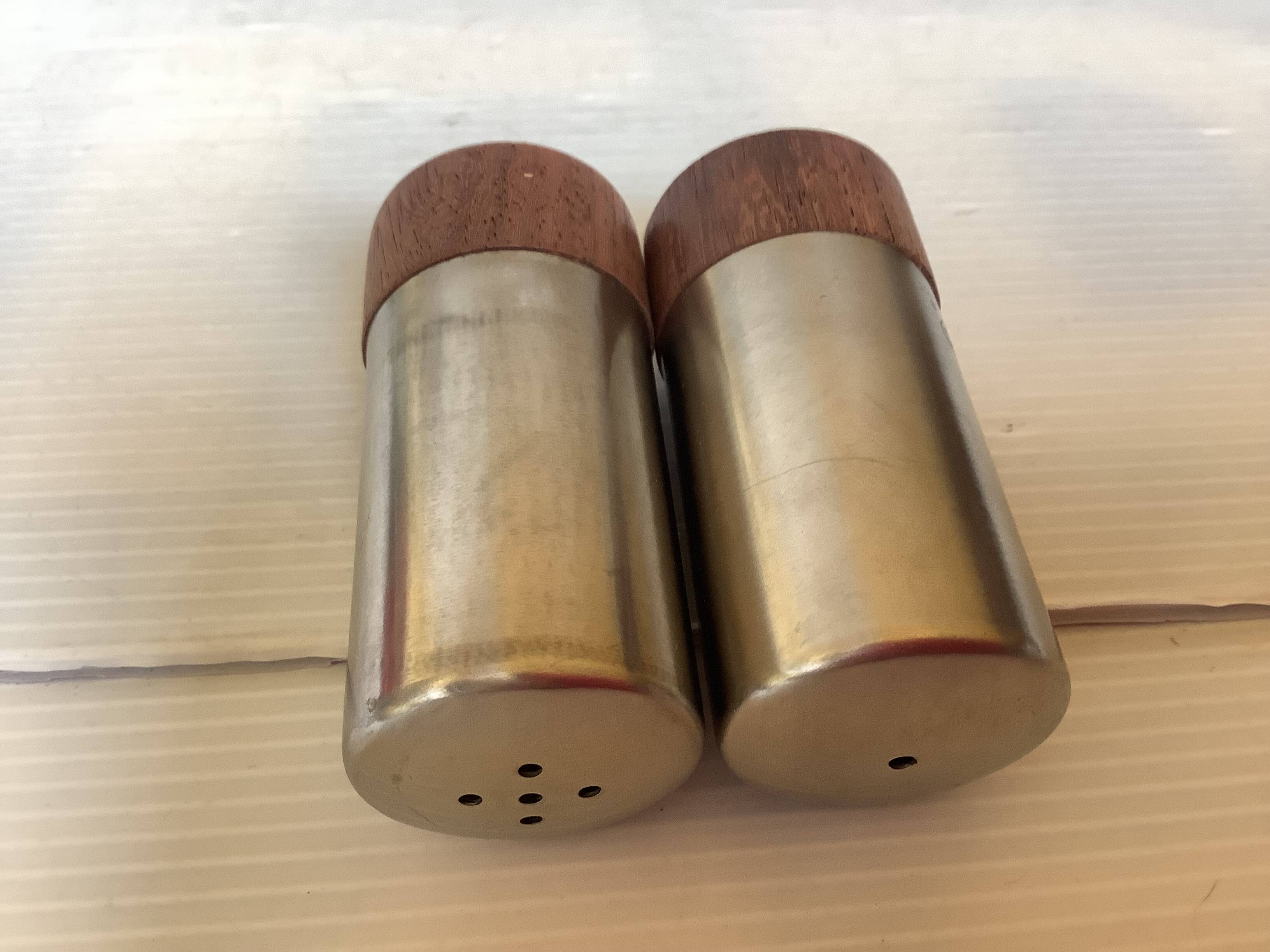 Salt and pepper set in teak and metal, Scandinavian style.