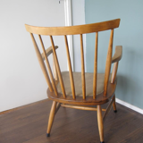 Chair in wood with file at bars