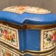 Domed porcelain box polychrome floral decoration on blue background brand Sèvres