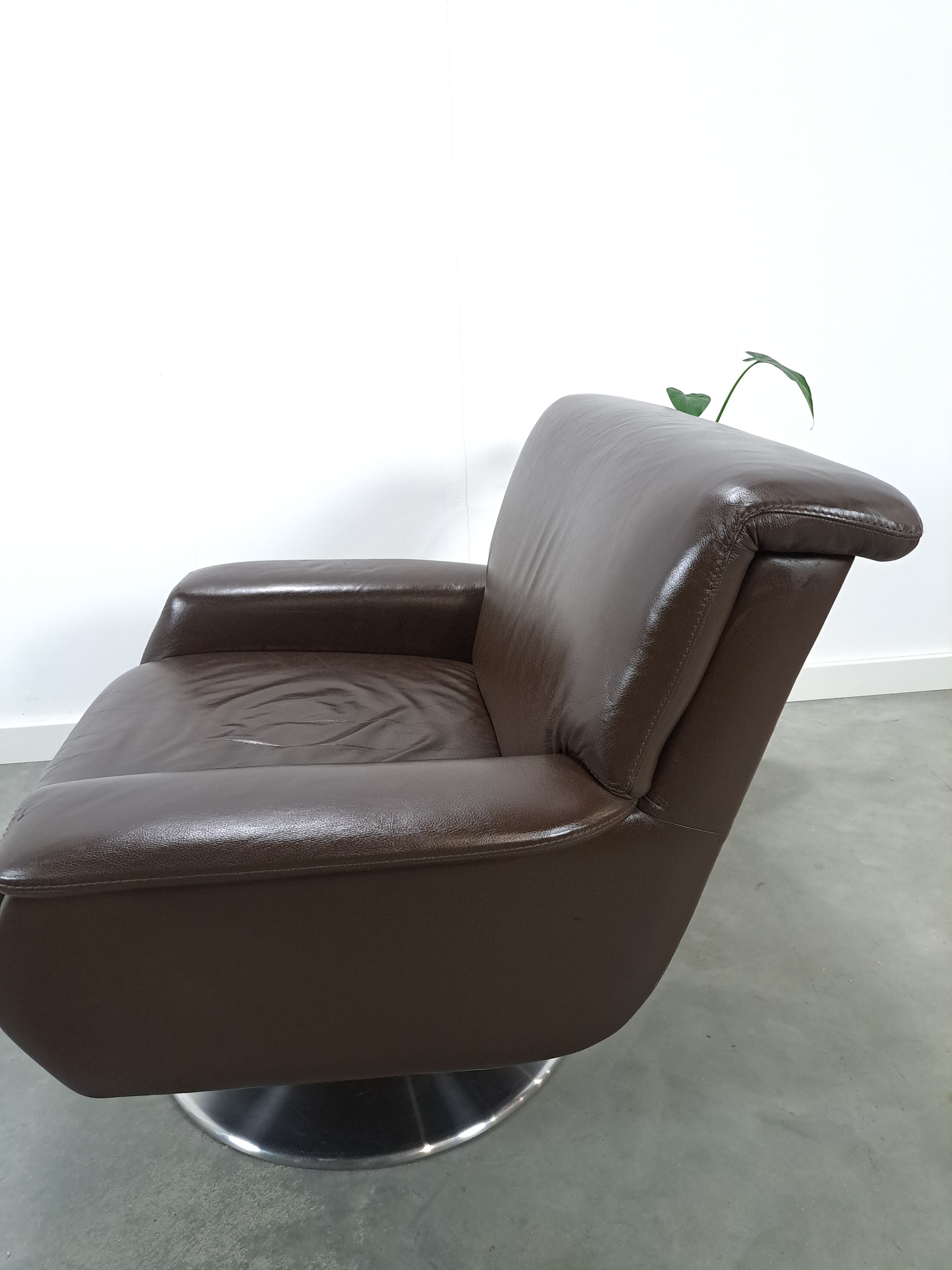 Brown leather swivel chair