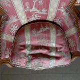 Pair of Louis XVI style armchairs in walnut and pink silk and ecru