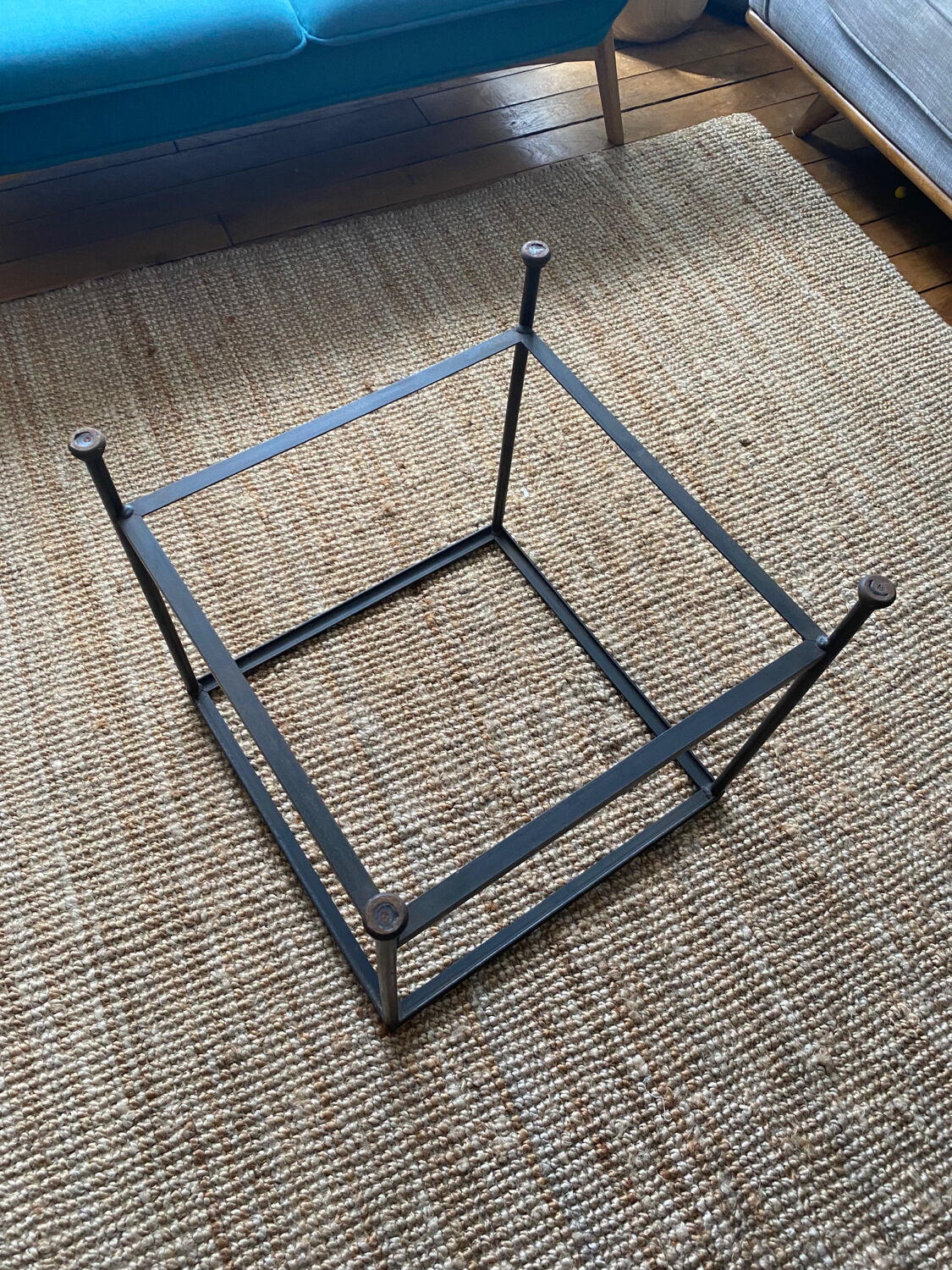 Glass and wrought iron coffee table design