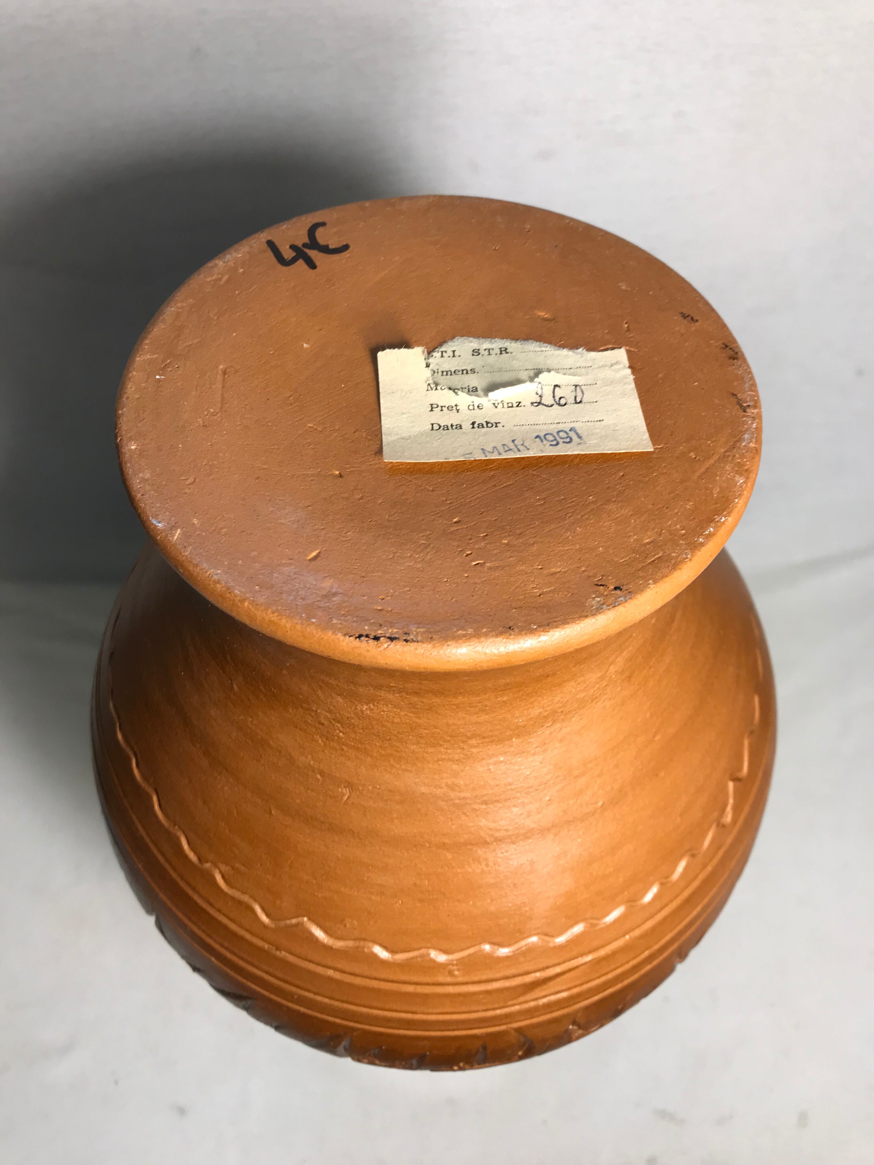 Old terracotta vase carved interior black vintage