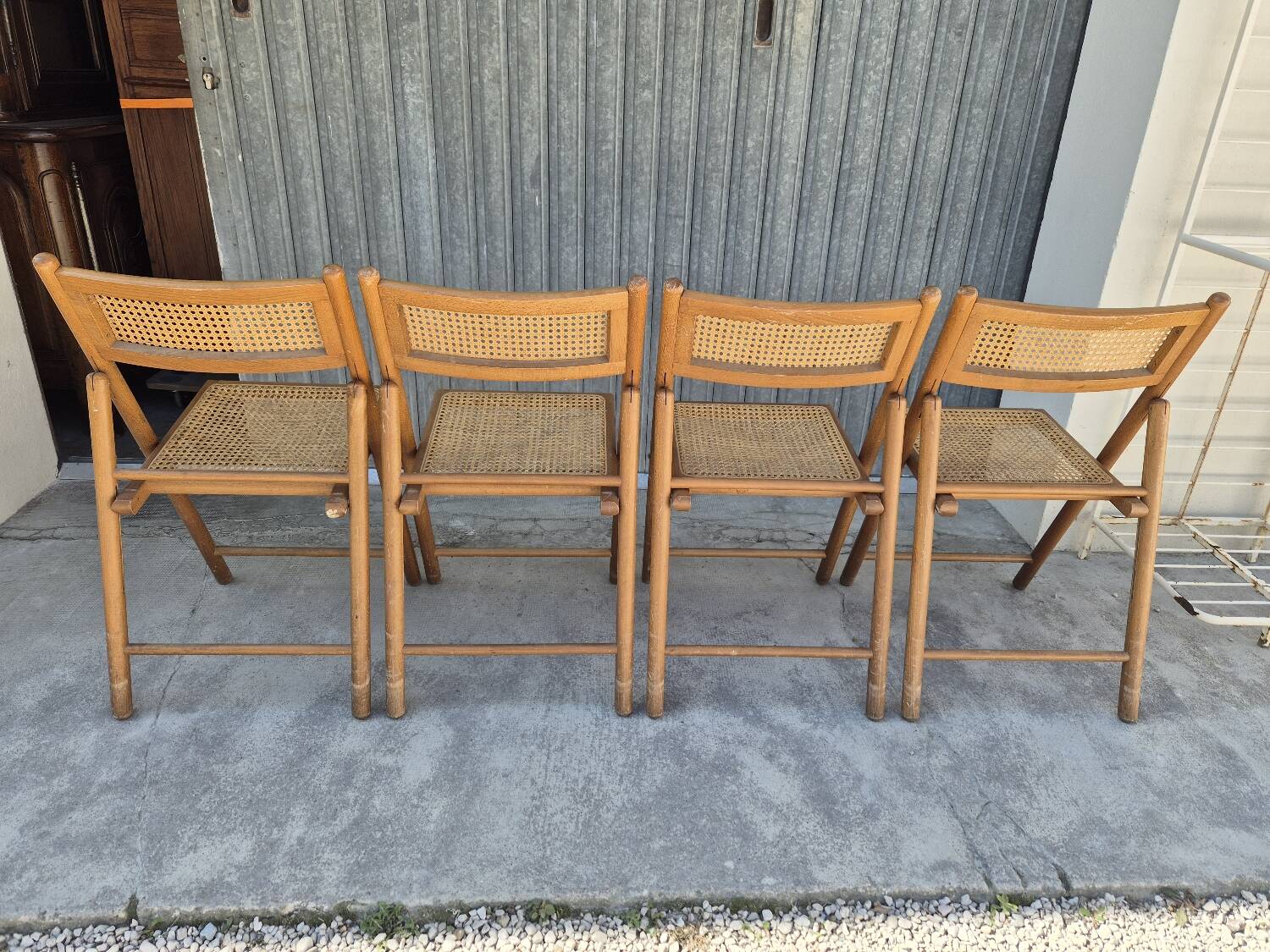 Set of 4 vintage Italian folding chairs in cane 1970s