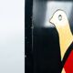 Room divider in art deco style with birds, geometric patterns, red, yellow, blue