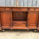 Antique sideboard with rounded edges in pitch pine from the late 19th century.