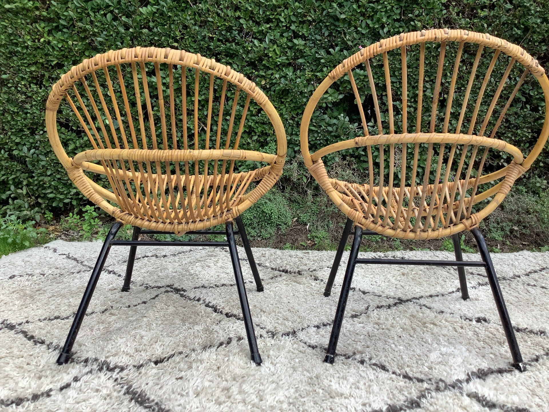 Pair of children's armchairs in rattan from the 1960s.
