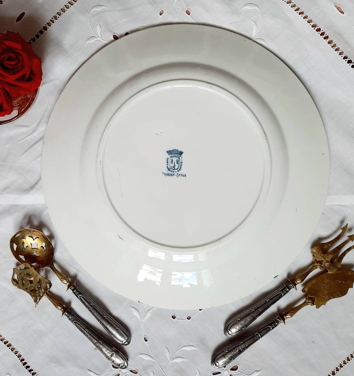 Old mismatched iron earthenware dessert plates accompanied by a dish