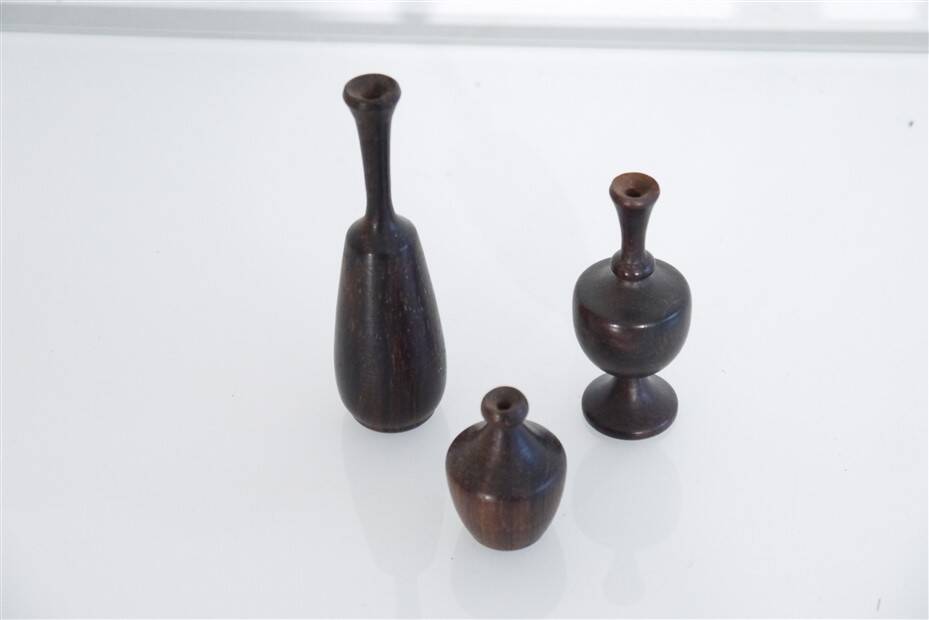 Set of 3 miniature rosewood vases