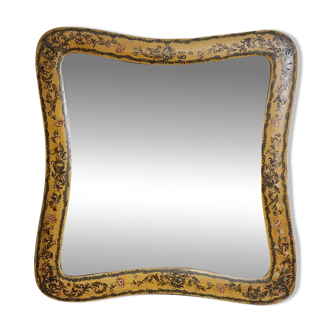 Important rectangular Venetian mirror with a richly painted wooden frame.