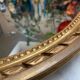 Large oval mirror in wood gilded with fine gold