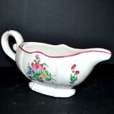 Lunéville KG earthenware sauce boat with polychrome painted flowers, revolving lamp.