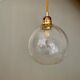 Suspension globe vintage en verre légèrement bullé
