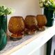 Set of three vintage wall or ceiling lights in amber chiseled glass