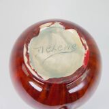 Large red and blue glazed ceramic pitcher signed Delène under the base