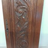 Paire d'anciens panneaux de porte en bois chêne sculpté