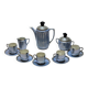 Art deco coffee service in fine iridescent blue porcelain, metal and wood