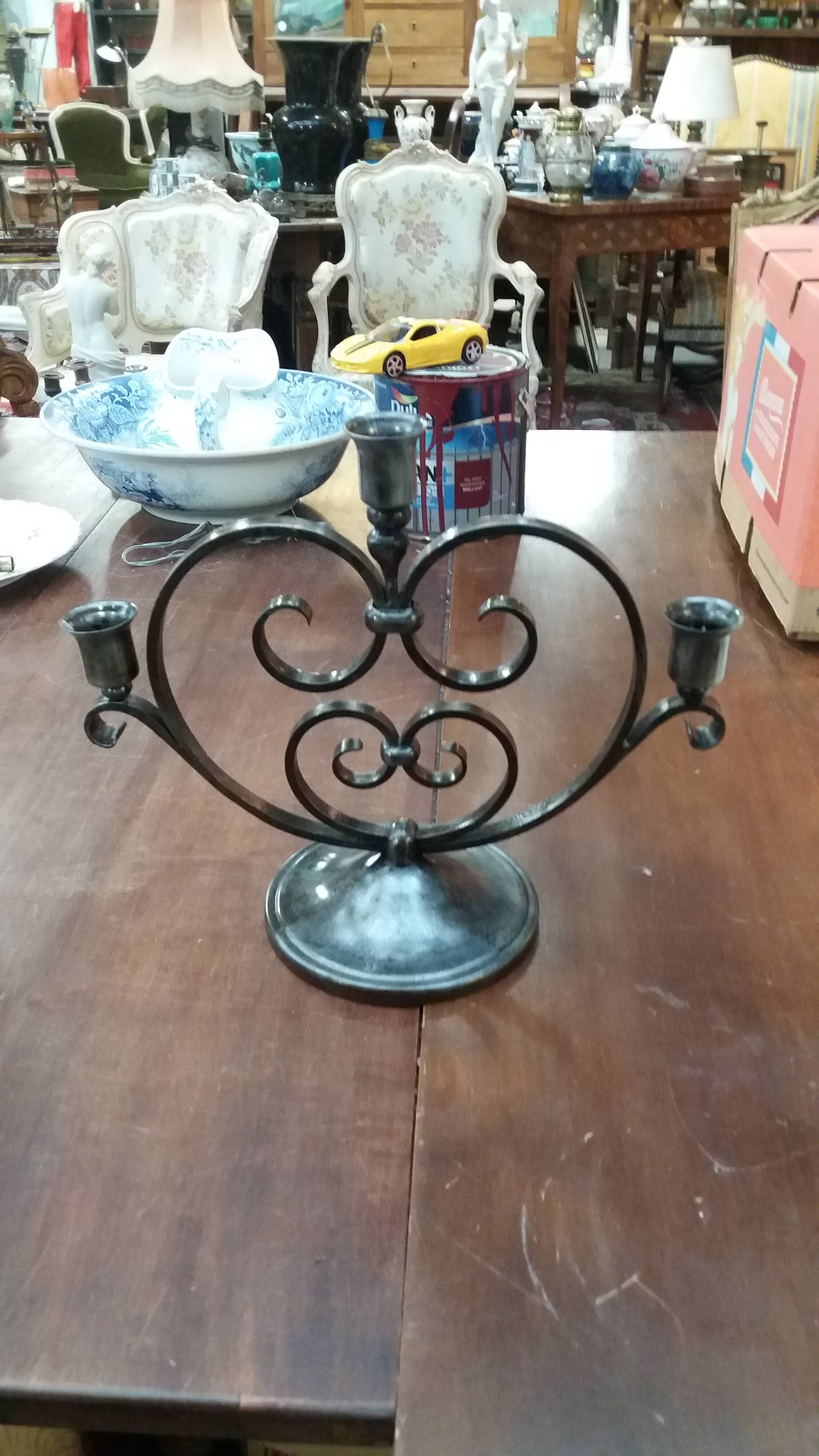 Wrought iron chandelier by Charles Piguet