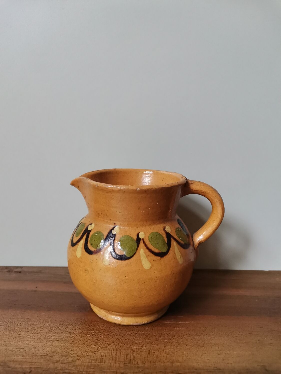 Hand-painted rustic enamelled vintage pitcher