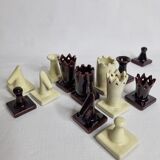 Original chess set in glazed terracotta, signed and numbered