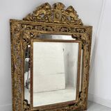 Miroir a pare closes de style Louis XIV en bois et stuc doré XIX siècle