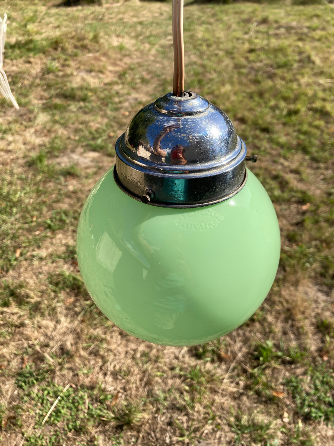 Suspension ball in art deco green glass 1930