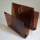 Smoked plexiglass magazine holder, 70s