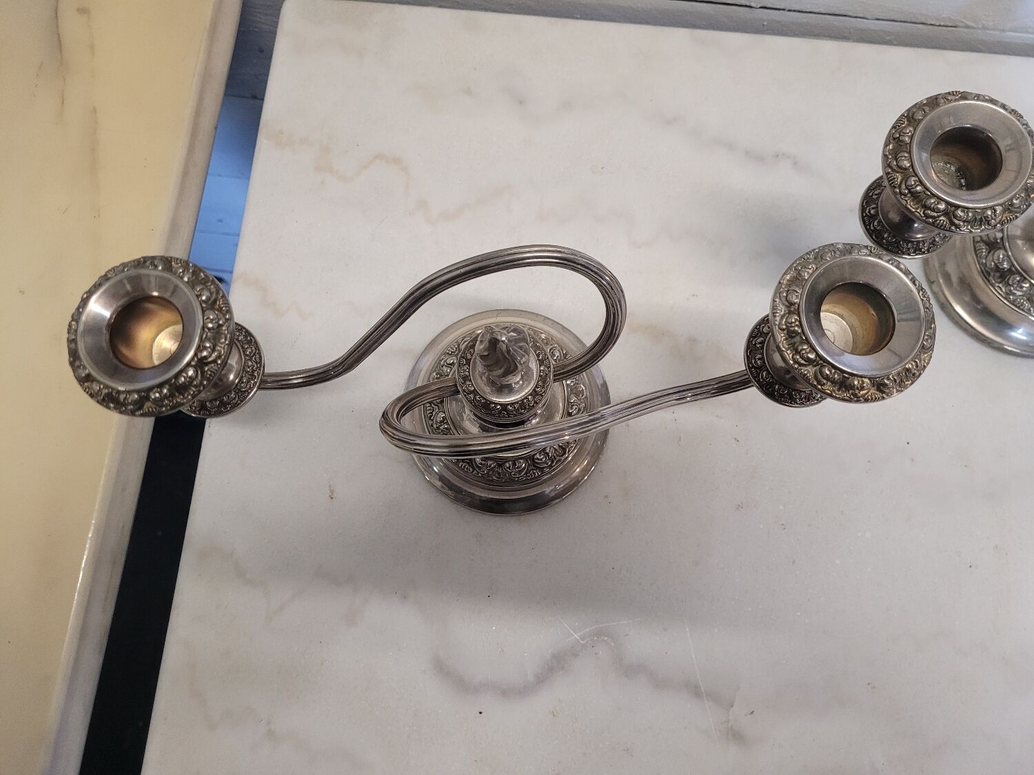 Pair of silver metal candlesticks