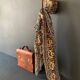 Wall hook in hand-carved wood and iron, antique, India, 1920