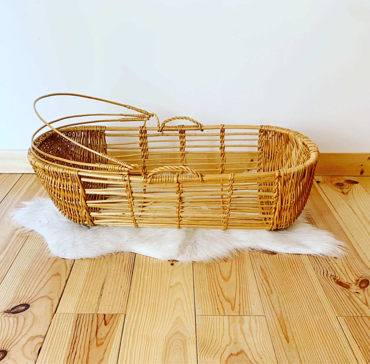 Vintage wicker and rattan bassinet