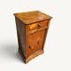 Small rustic antique bedside table made of solid wood.