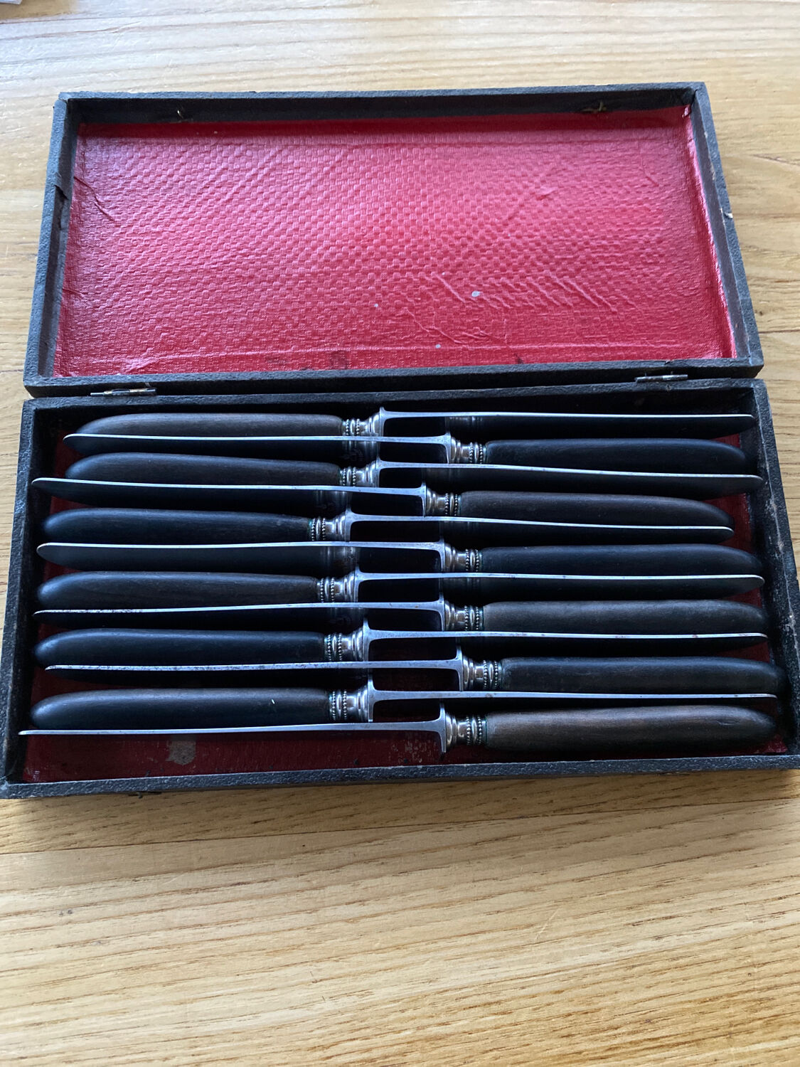 12 knives melted steel ebony handle