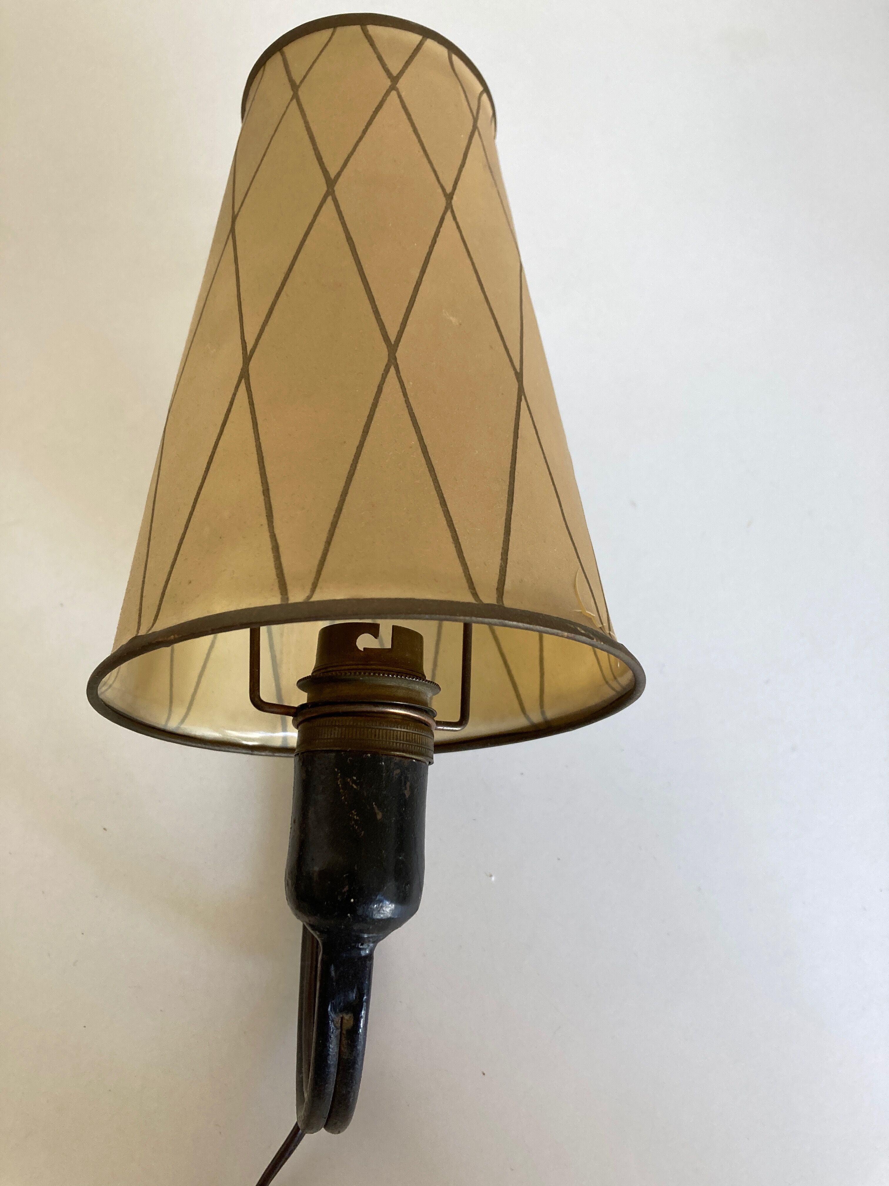 Art deco beaten iron wall lamp
