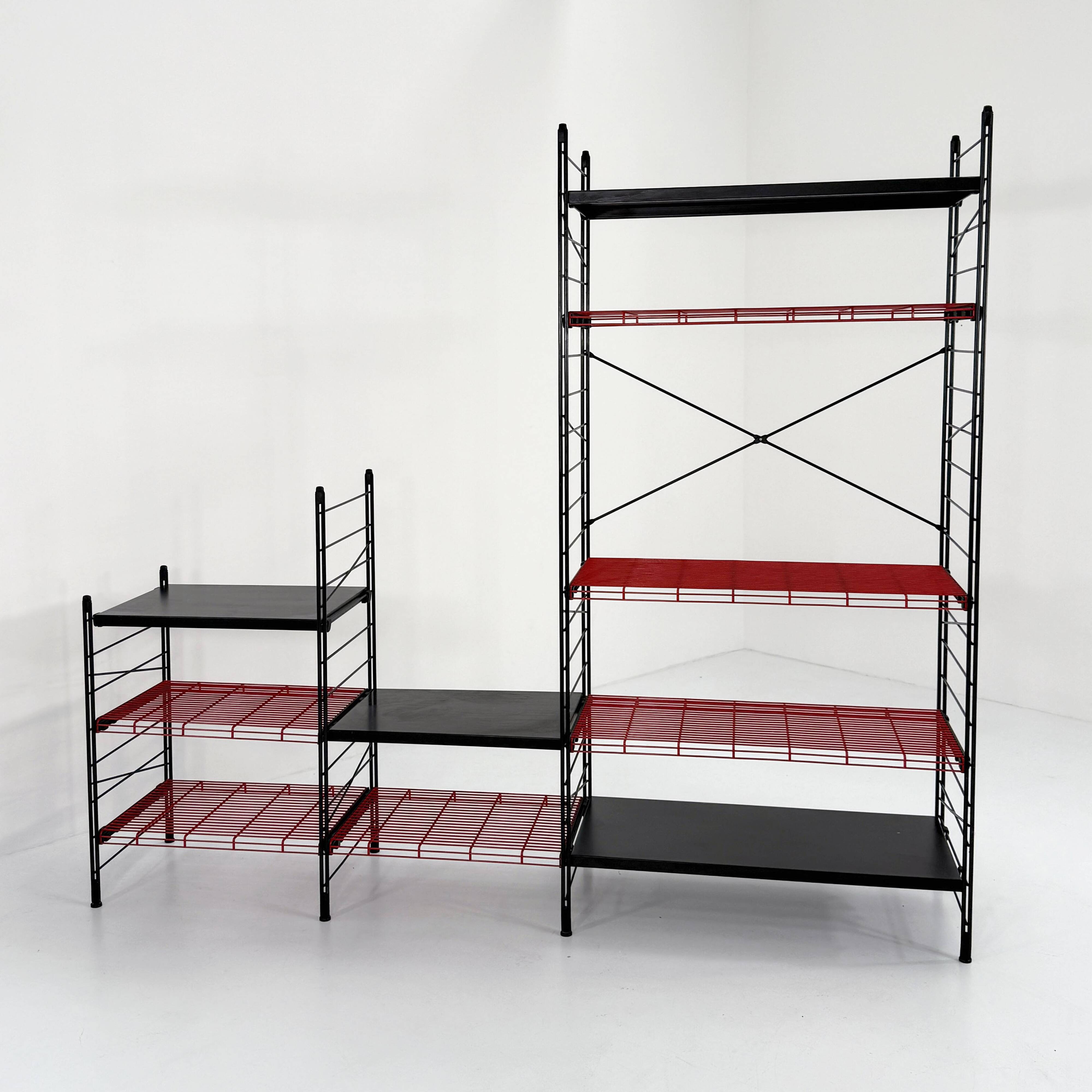 Modular, postmodern, red and black freestanding shelving unit, 1980