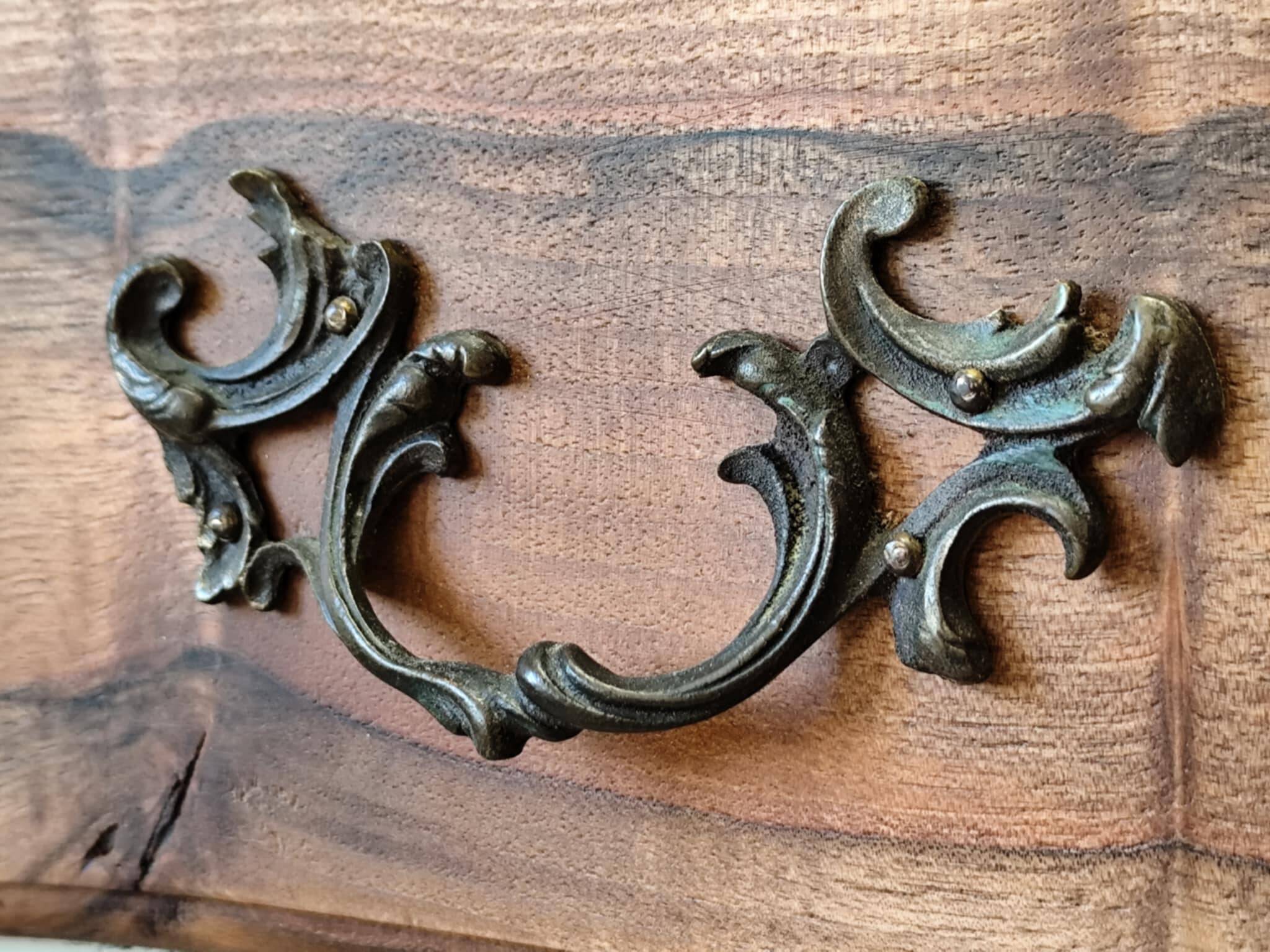 Walnut crossbow chest of drawers