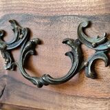 Walnut crossbow chest of drawers