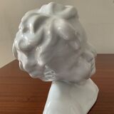 Cherub child bust in enamelled porcelain