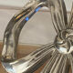 Lancel trivet, bow and ribbon, silver-plated metal
