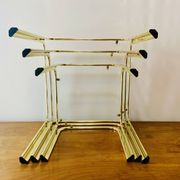 Vintage nesting tables in gold metal and smoked glass