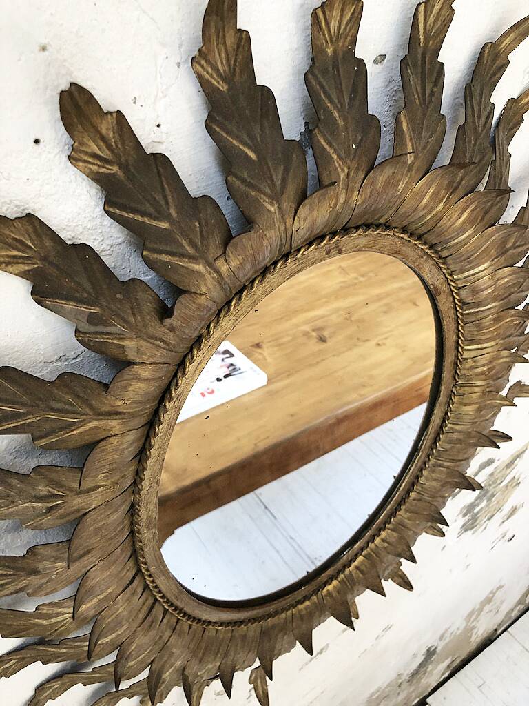 Old flowered sun golden mirror