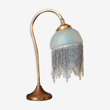 Brass lamp, blue glass paste lampshade and tassels