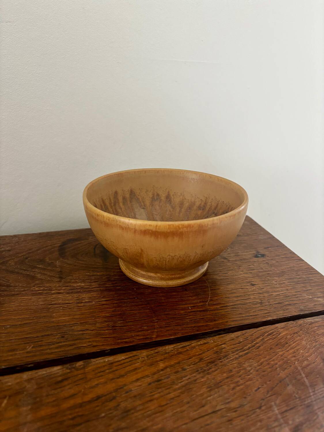 Vintage stoneware bowl on a vintage stand.