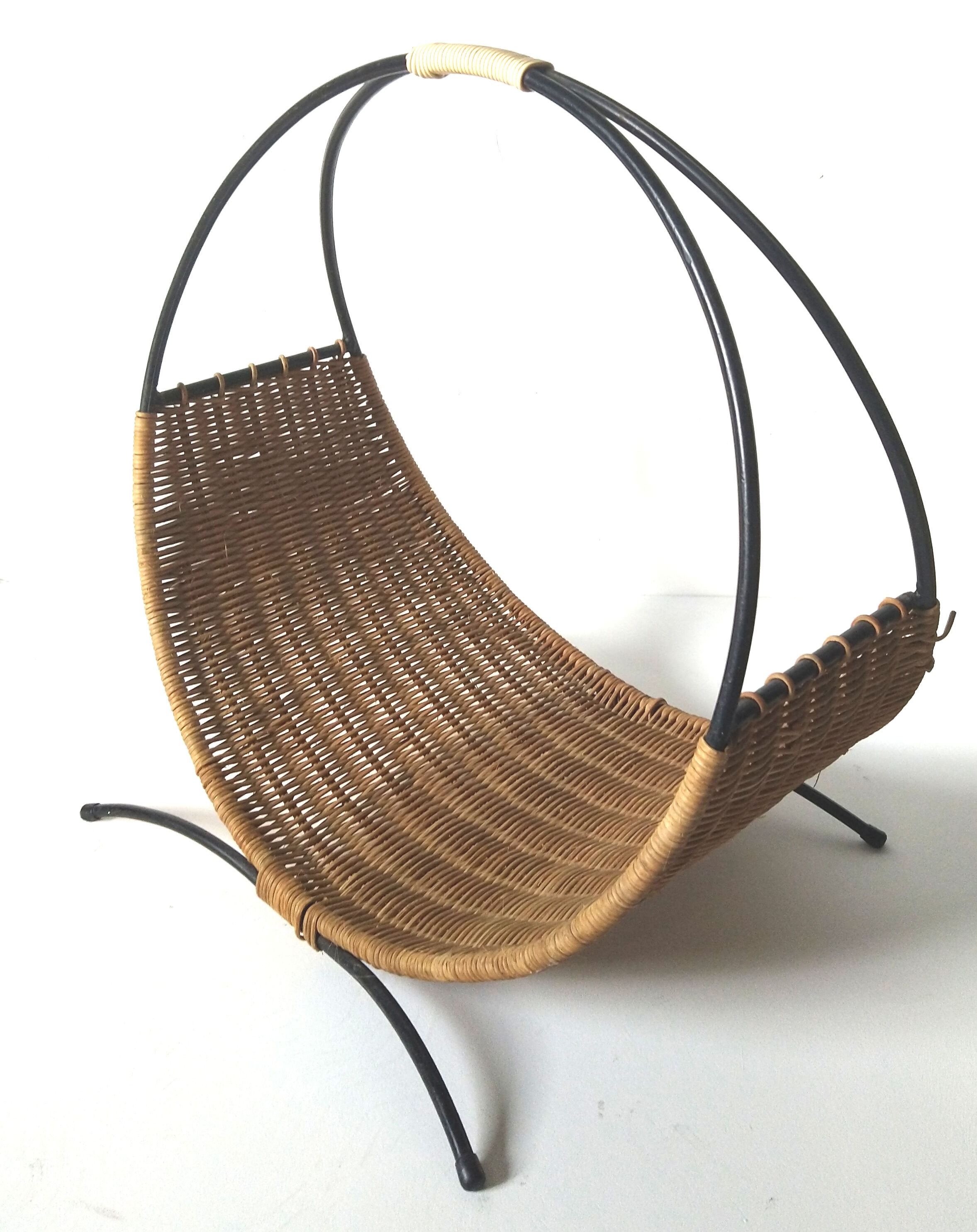 Rattan basket with logs