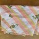 Nappe en Tergal à rayures orange et fleurs kaki vintage 1970